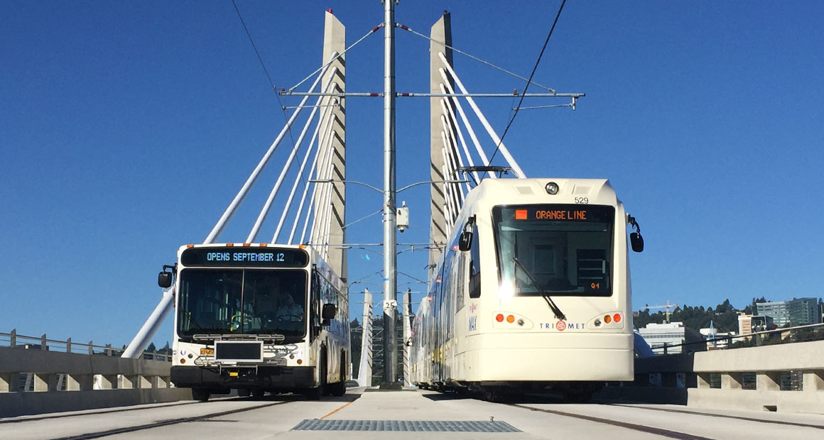 MAX and bus on the Tilikum Crossing