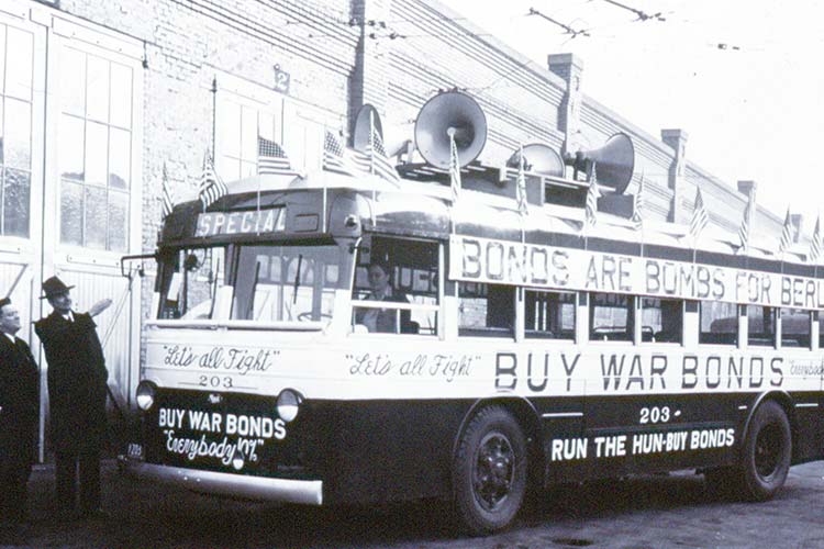 Transit bus featuring war bonds advertisement during WWII